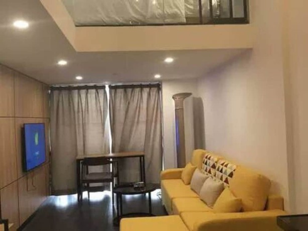 Imagen de la habitación del Hotel Xitishu Apartment. Foto 13
