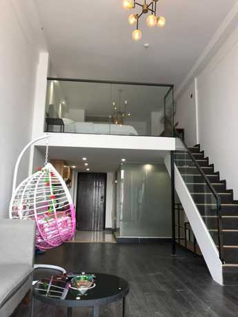 Imagen de la habitación del Hotel Xitishu Apartment. Foto 14