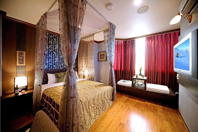 Imagen de la habitación del Hotel Xiu Shui. Foto 3