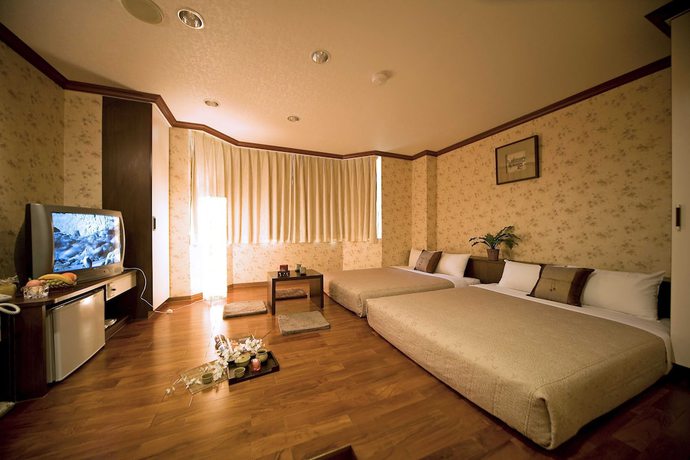 Imagen de la habitación del Hotel Xiu Shui. Foto 8