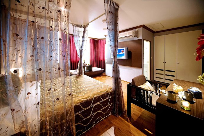 Imagen de la habitación del Hotel Xiu Shui. Foto 9
