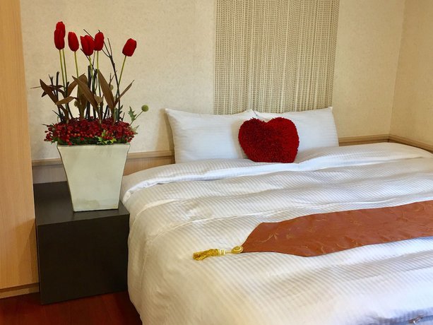 Imagen de la habitación del Hotel Xiu Shui. Foto 12