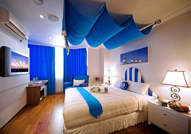 Imagen de la habitación del Hotel Xiu Shui. Foto 14