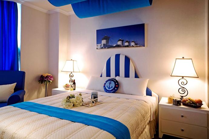 Imagen de la habitación del Hotel Xiu Shui. Foto 17