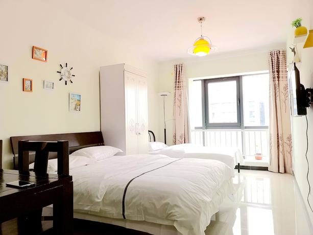 Imagen de la habitación del Hotel Xiwangju Apart-hotel. Foto 8