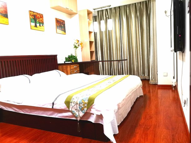 Imagen de la habitación del Hotel Xiwangju Apart-hotel. Foto 15