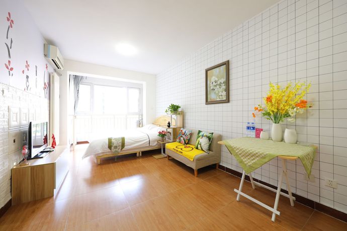 Imagen de la habitación del Hotel Xiwangju Apart-hotel. Foto 17