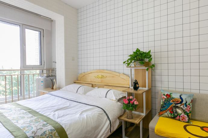 Imagen de la habitación del Hotel Xiwangju Apart-hotel. Foto 18