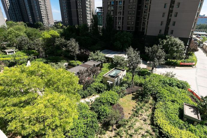 Imagen de la habitación del Hotel Xiwangju Apart-hotel. Foto 19