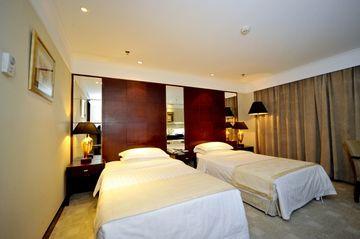 Imagen de la habitación del Hotel Xixi Friendship. Foto 5