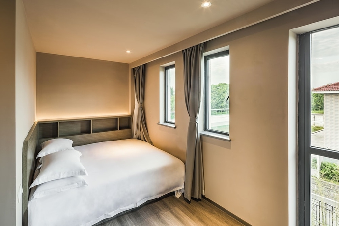 Imagen de la habitación del Hotel Xixi Shop Archipelago Apartment. Foto 2