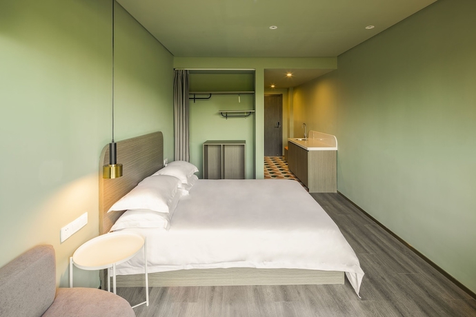 Imagen de la habitación del Hotel Xixi Shop Archipelago Apartment. Foto 17