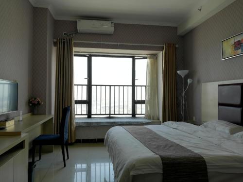 Imagen de la habitación del Hotel Xizhengjia Apartment (guangzhou Financial City Keyun Road Subway Station Store). Foto 4