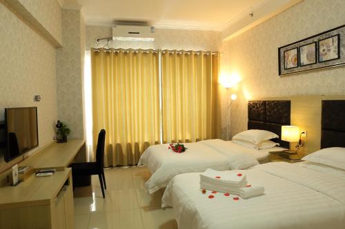 Imagen de la habitación del Hotel Xizhengjia Apartment (guangzhou Financial City Keyun Road Subway Station Store). Foto 5