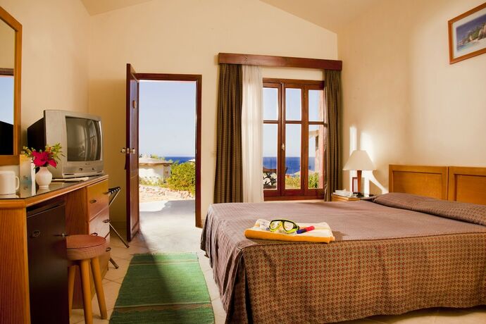 Imagen de la habitación del Hotel Xperience Hill-Top Beach Resort. Foto 18