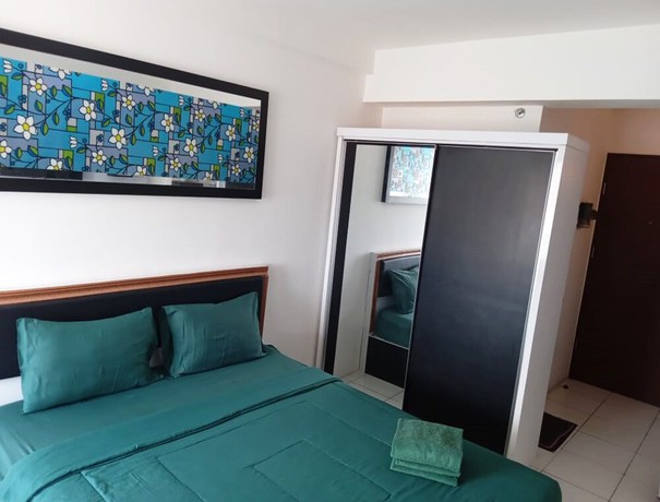 Imagen de la habitación del Hotel X-pressbedroom Riverview Cikarang. Foto 12