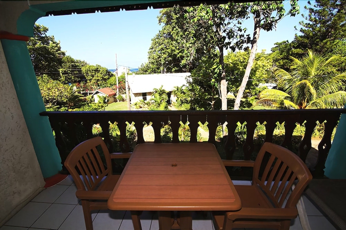 Imagen de la habitación del Hotel Xtabi Resort. Foto 13