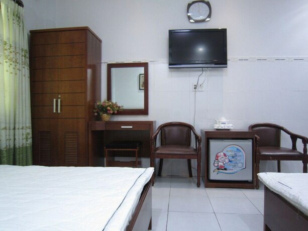 Imagen de la habitación del Hotel Xuan Dan. Foto 16