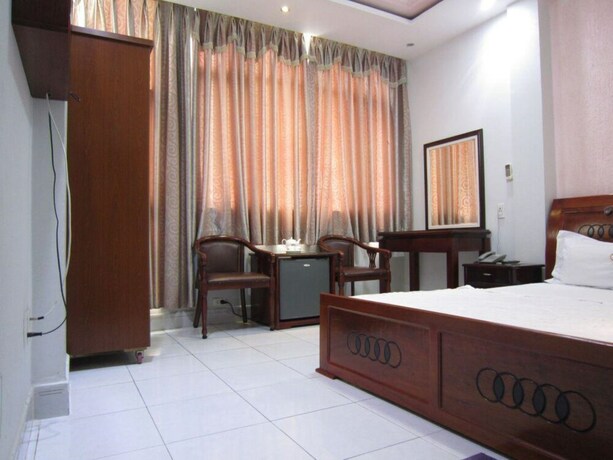 Imagen de la habitación del Hotel Xuan Dan. Foto 17