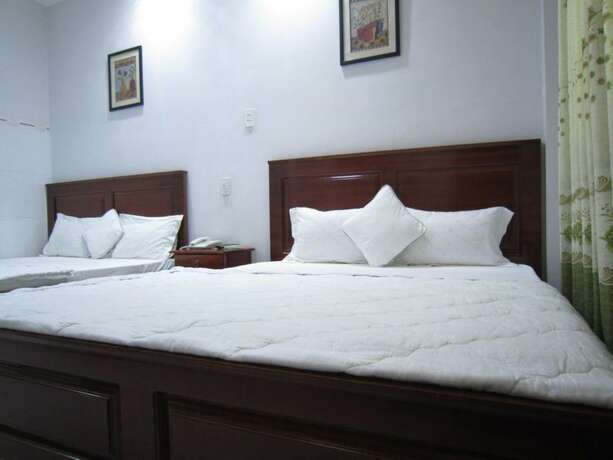 Imagen de la habitación del Hotel Xuan Dan. Foto 26