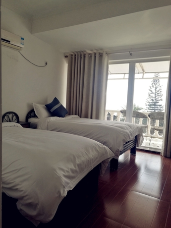 Imagen de la habitación del Hotel Xun Liao Bay Delta Island. Foto 8