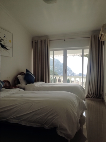 Imagen de la habitación del Hotel Xun Liao Bay Delta Island. Foto 9