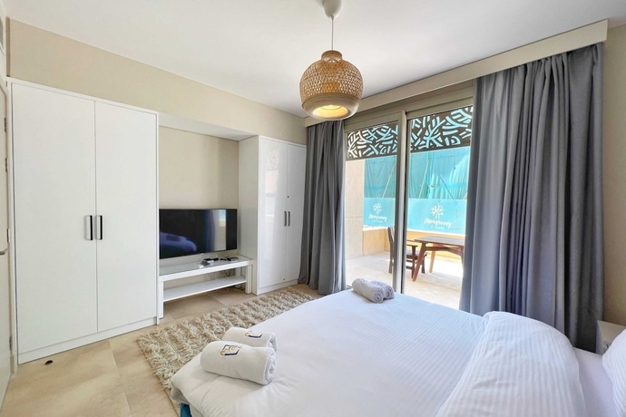 Imagen de la habitación del Hotel Xuru Stays I Exotic 1bdr w/ Outdoor Terrace Pool and Beach Access. Foto 4