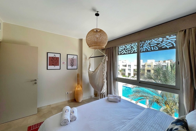 Imagen de la habitación del Hotel Xuru Stays I Exotic 1bdr w/ Outdoor Terrace Pool and Beach Access. Foto 10