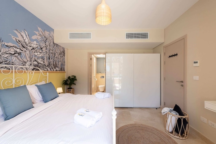 Imagen de la habitación del Hotel Xuru Stays I Exotic 1bdr w/ Outdoor Terrace Pool and Beach Access. Foto 11