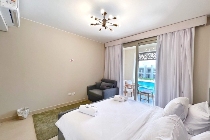 Imagen de la habitación del Hotel Xuru Stays I Homestyle and Summery 1bdr@ Mangroovy Free Beach Pool. Foto 10