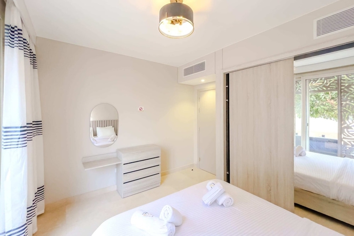 Imagen de la habitación del Hotel Xuru Stays I Homestyle and Summery 1bdr@ Mangroovy Free Beach Pool. Foto 11