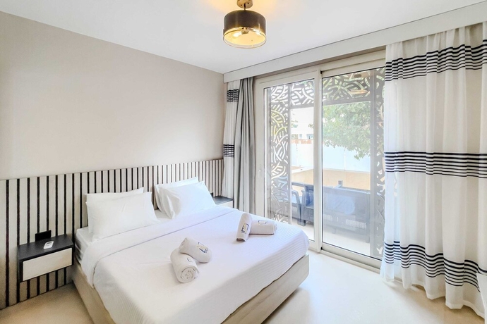 Imagen de la habitación del Hotel Xuru Stays I Homestyle and Summery 1bdr@ Mangroovy Free Beach Pool. Foto 12