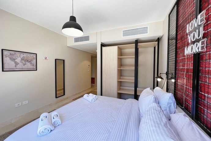 Imagen de la habitación del Hotel Xuru Stays I Sparky and Summery 2 BDR @ Mangroovy Free Beach and Pool Access. Foto 2