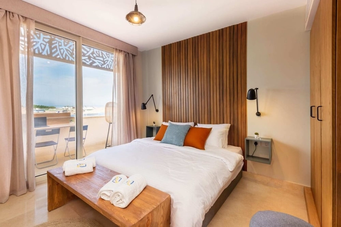Imagen de la habitación del Hotel Xuru Stays I Sparky and Summery 2 BDR @ Mangroovy Free Beach and Pool Access. Foto 3