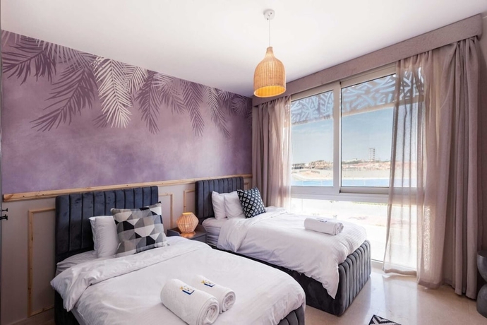 Imagen de la habitación del Hotel Xuru Stays I Sparky and Summery 2 BDR @ Mangroovy Free Beach and Pool Access. Foto 4