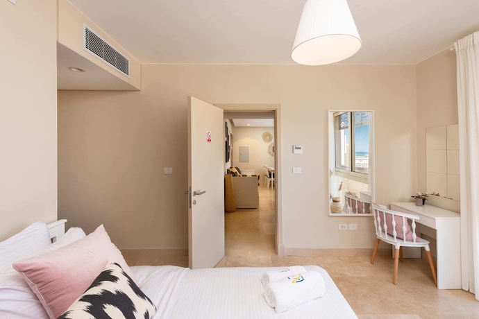 Imagen de la habitación del Hotel Xuru Stays I Sparky and Summery 2 BDR @ Mangroovy Free Beach and Pool Access. Foto 9