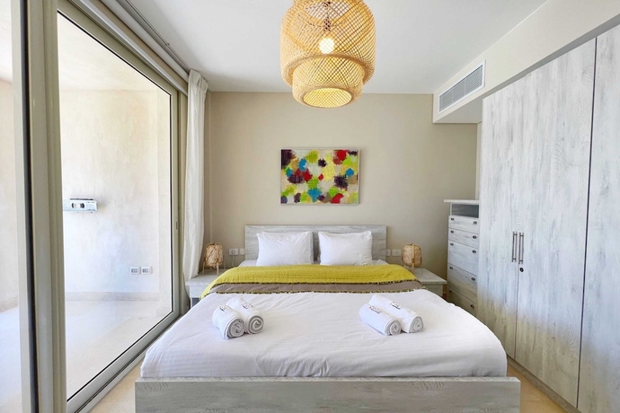 Imagen de la habitación del Hotel Xuru Stays I Sparky and Summery 2 BDR @ Mangroovy Free Beach and Pool Access. Foto 10
