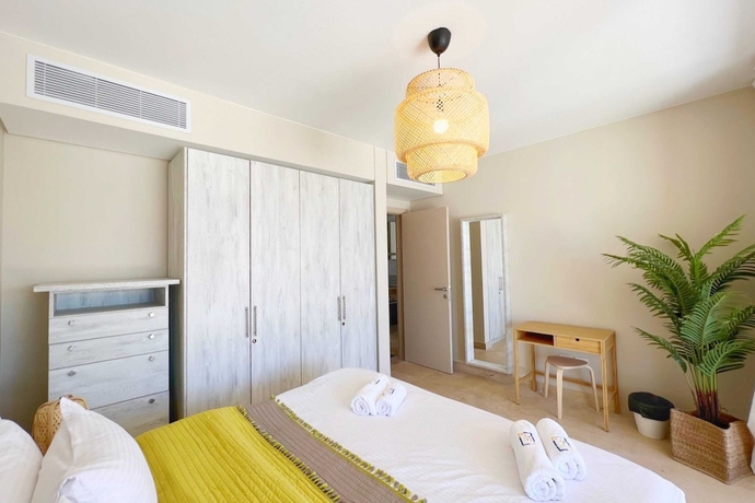 Imagen de la habitación del Hotel Xuru Stays I Sparky and Summery 2 BDR @ Mangroovy Free Beach and Pool Access. Foto 12