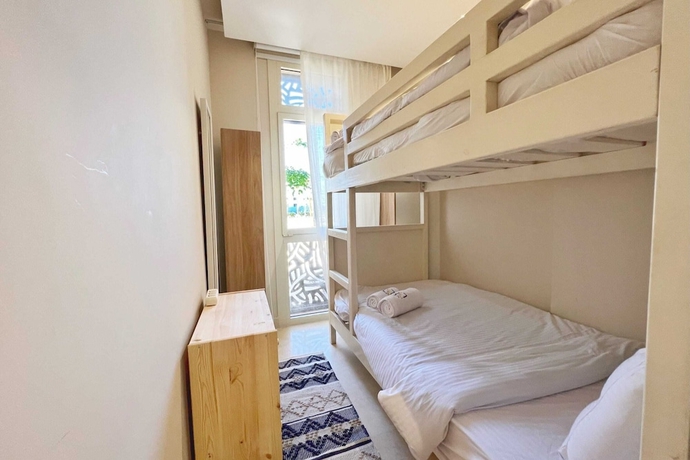 Imagen de la habitación del Hotel Xuru Stays I Sparky and Summery 2 BDR @ Mangroovy Free Beach and Pool Access. Foto 13
