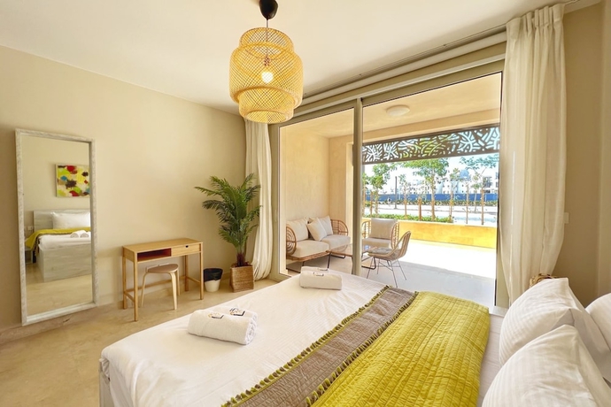 Imagen de la habitación del Hotel Xuru Stays I Sparky and Summery 2 BDR @ Mangroovy Free Beach and Pool Access. Foto 14