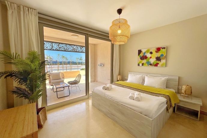 Imagen de la habitación del Hotel Xuru Stays I Sparky and Summery 2 BDR @ Mangroovy Free Beach and Pool Access. Foto 15