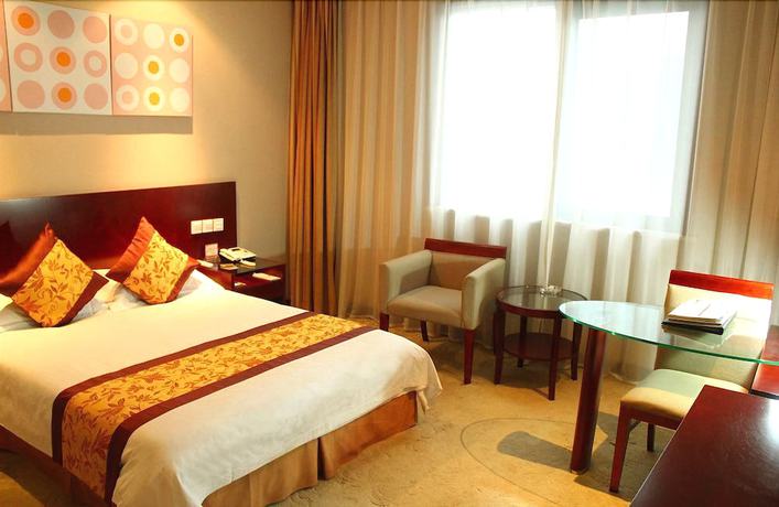 Imagen de la habitación del Hotel Xuzhou Zhonghui International Conference Center. Foto 12