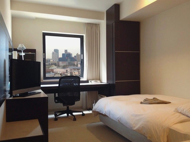 Imagen de la habitación del Hotel X-wave Umeda. Foto 6