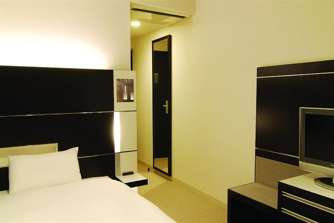 Imagen de la habitación del Hotel X-wave Umeda. Foto 7