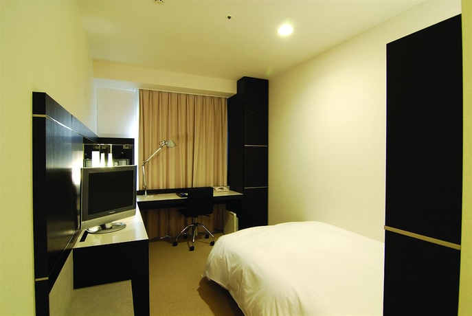 Imagen de la habitación del Hotel X-wave Umeda. Foto 9