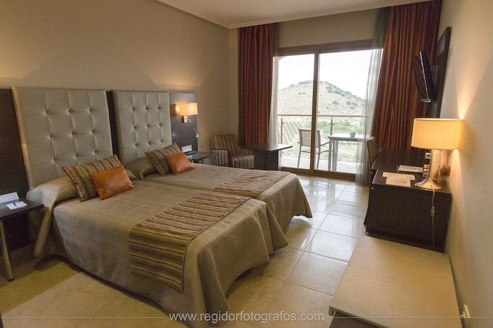 Imagen de la habitación del Hotel Y Apartamentos Quinto Cecilio. Foto 2