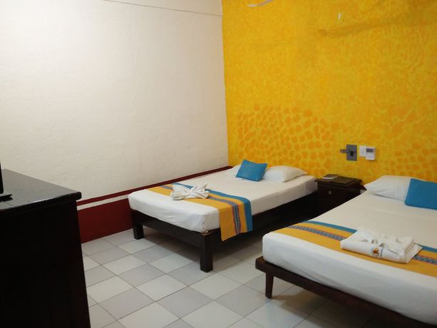Imagen de la habitación del Hotel Y Bungalows Acuario. Foto 8