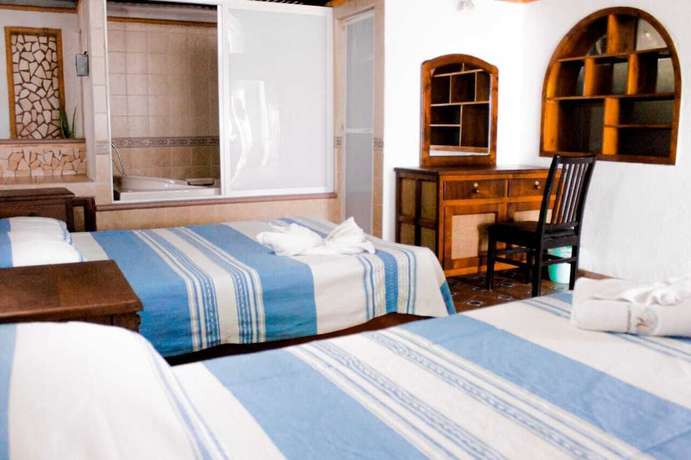 Imagen de la habitación del Hotel Y Bungalows Acuario. Foto 11
