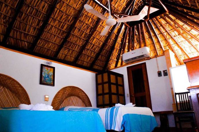 Imagen de la habitación del Hotel Y Bungalows Acuario. Foto 12