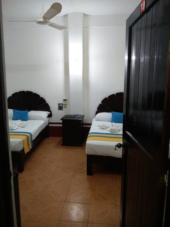 Imagen de la habitación del Hotel Y Bungalows Acuario. Foto 14